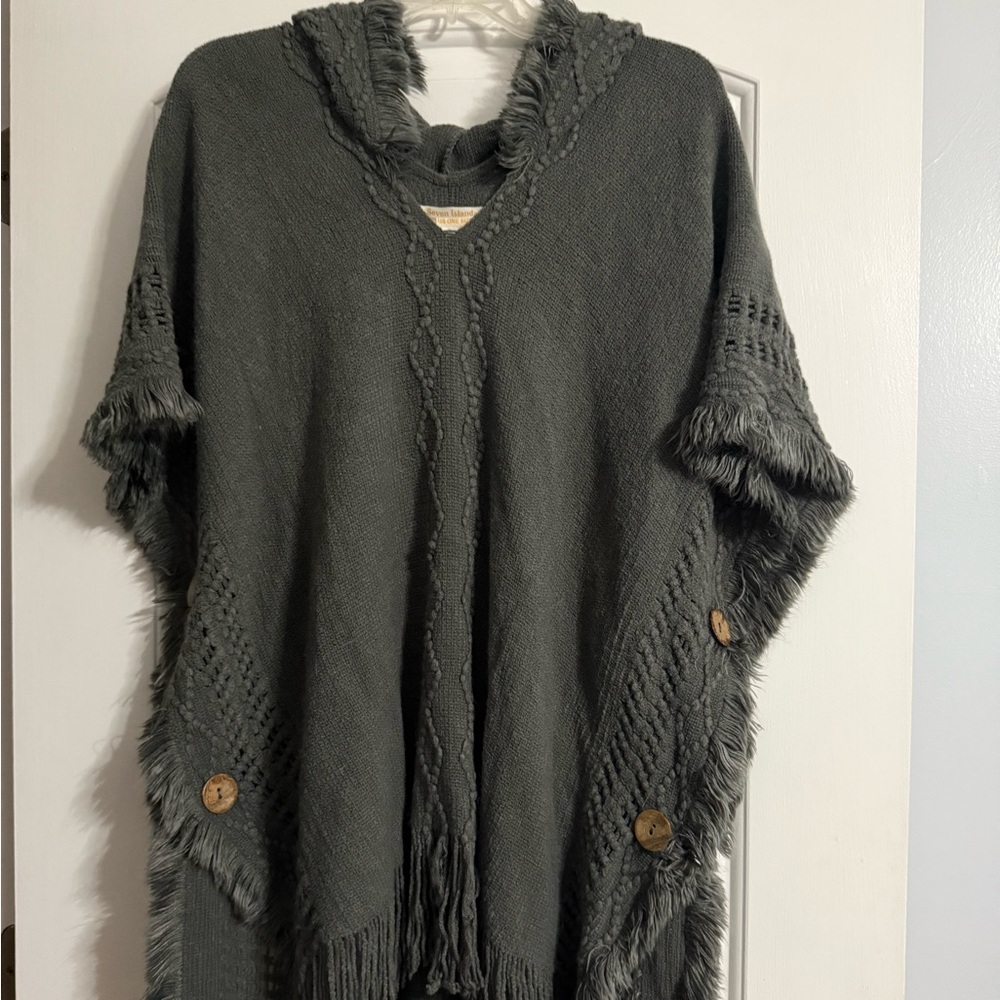 Seven Islands Shawl with fringe, wooden button detail. Plus One Size.